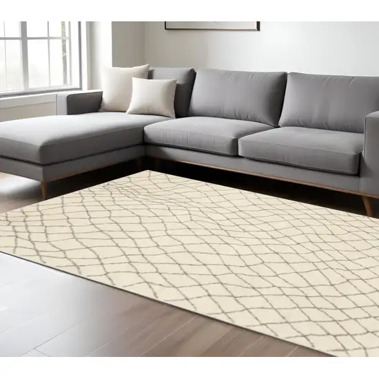 Ivory And Grey Geometric Power Loom Stain Resistant Area Rug Photo 1