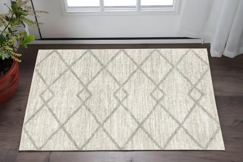Ivory And Grey Geometric Shag Power Loom Stain Resistant Area Rug Photo 1