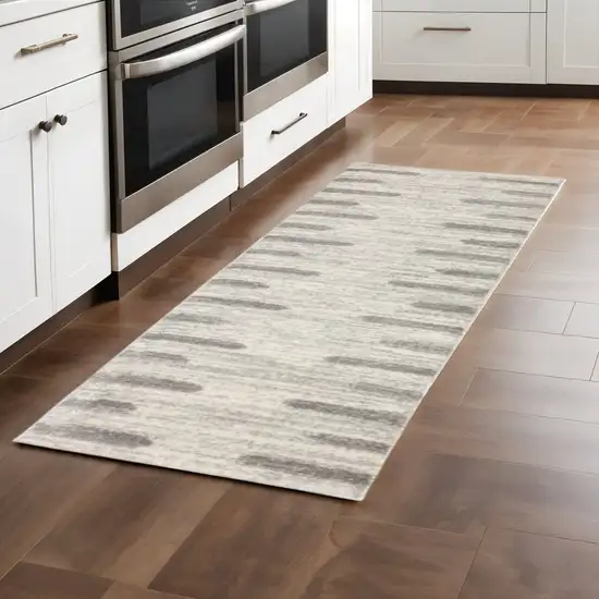 2' X 8' Ivory And Grey Geometric Shag Power Loom Stain Resistant Runner Rug Photo 1