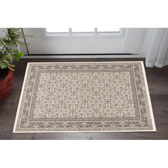 Ivory And Grey Oriental Power Loom Stain Resistant Area Rug With Fringe Photo 1