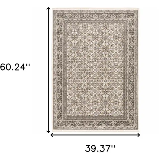 Ivory And Grey Oriental Power Loom Stain Resistant Area Rug With Fringe Photo 3
