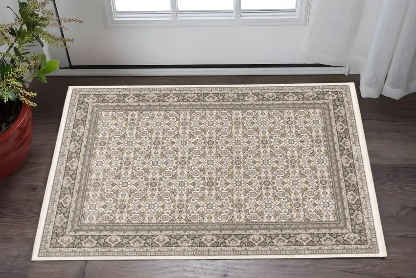 Ivory And Grey Oriental Power Loom Stain Resistant Area Rug With Fringe Photo 1