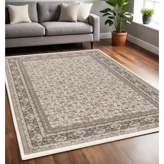 Ivory And Grey Oriental Power Loom Stain Resistant Area Rug With Fringe Photo 1