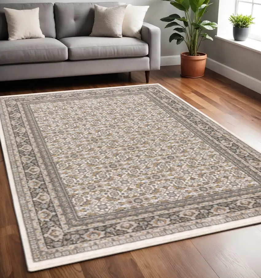 Ivory And Grey Oriental Power Loom Stain Resistant Area Rug With Fringe Photo 1