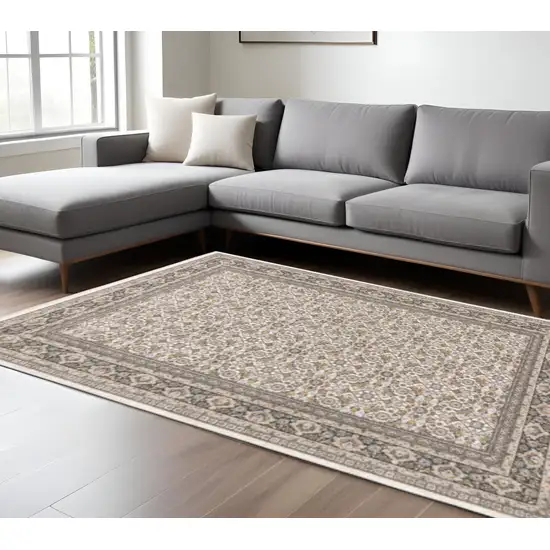 Ivory And Grey Oriental Power Loom Stain Resistant Area Rug With Fringe Photo 1