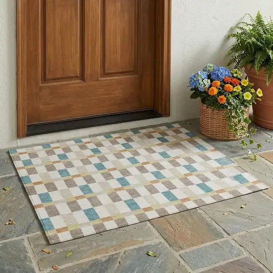 Ivory And Khaki Geometric Washable Indoor Outdoor Area Rug Photo 1
