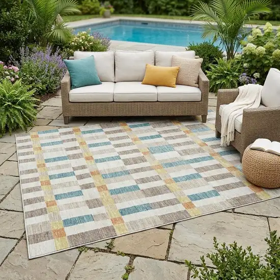 Ivory And Khaki Geometric Washable Indoor Outdoor Area Rug Photo 1