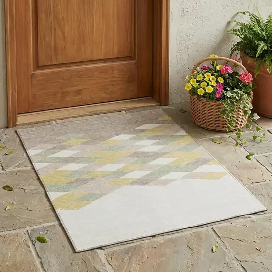 Ivory And Khaki Geometric Washable Indoor Outdoor Area Rug Photo 1