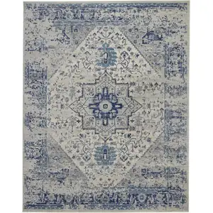 Photo of Ivory And Light Blue Floral Medallion Distressed Area Rug