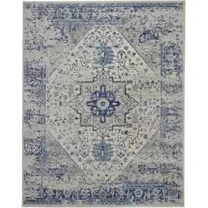 Photo of Ivory And Light Blue Floral Medallion Distressed Area Rug