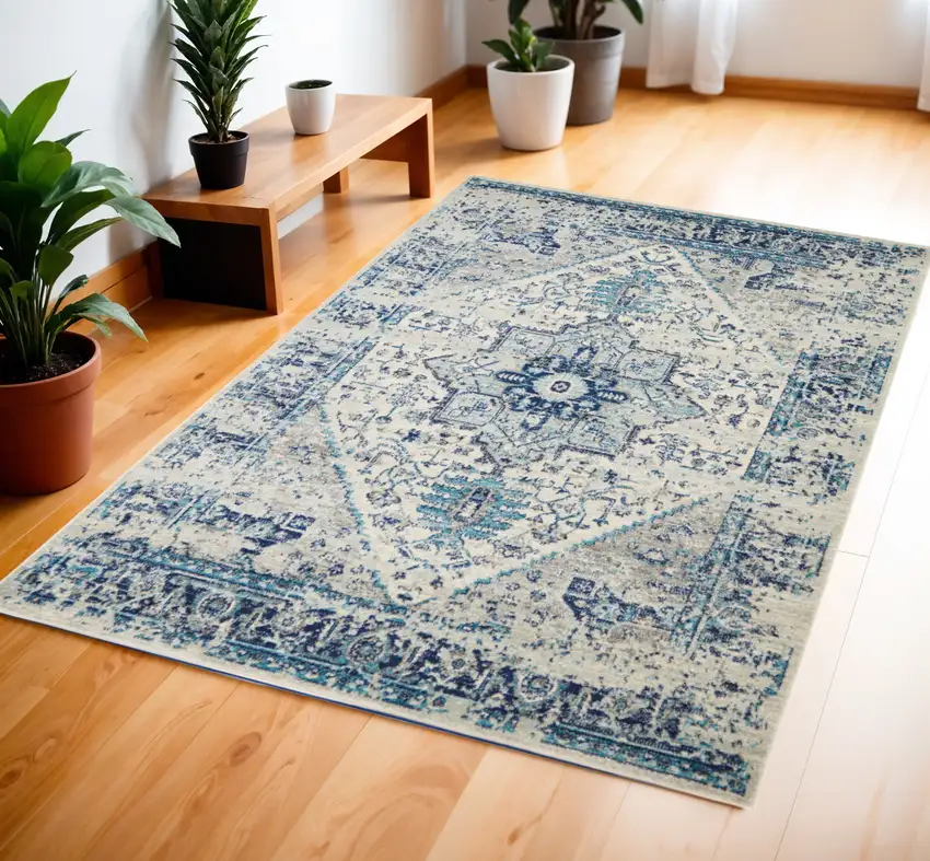 Ivory And Light Blue Floral Medallion Distressed Area Rug Photo 1