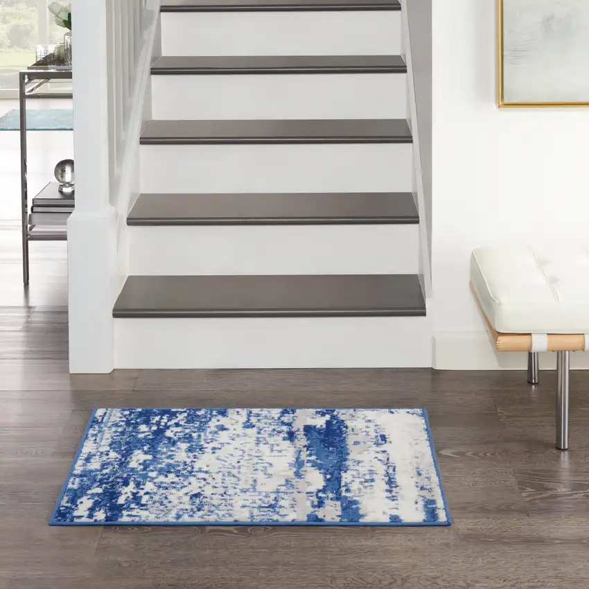 Ivory And Navy Blue Abstract Area Rug Photo 3