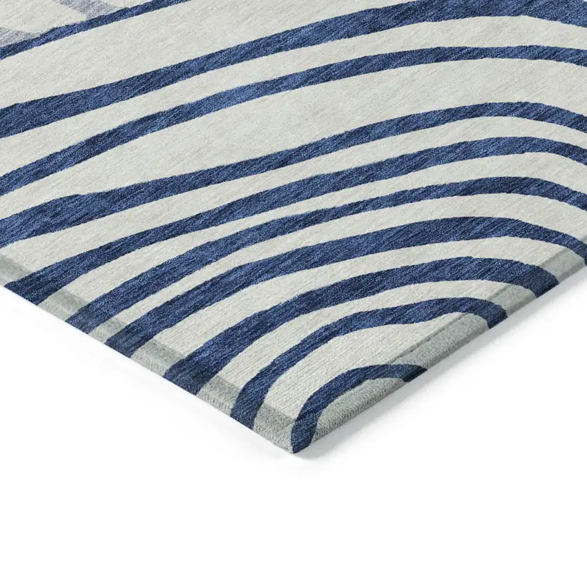 Ivory And Navy Blue Abstract Washable Indoor Outdoor Area Rug Photo 4