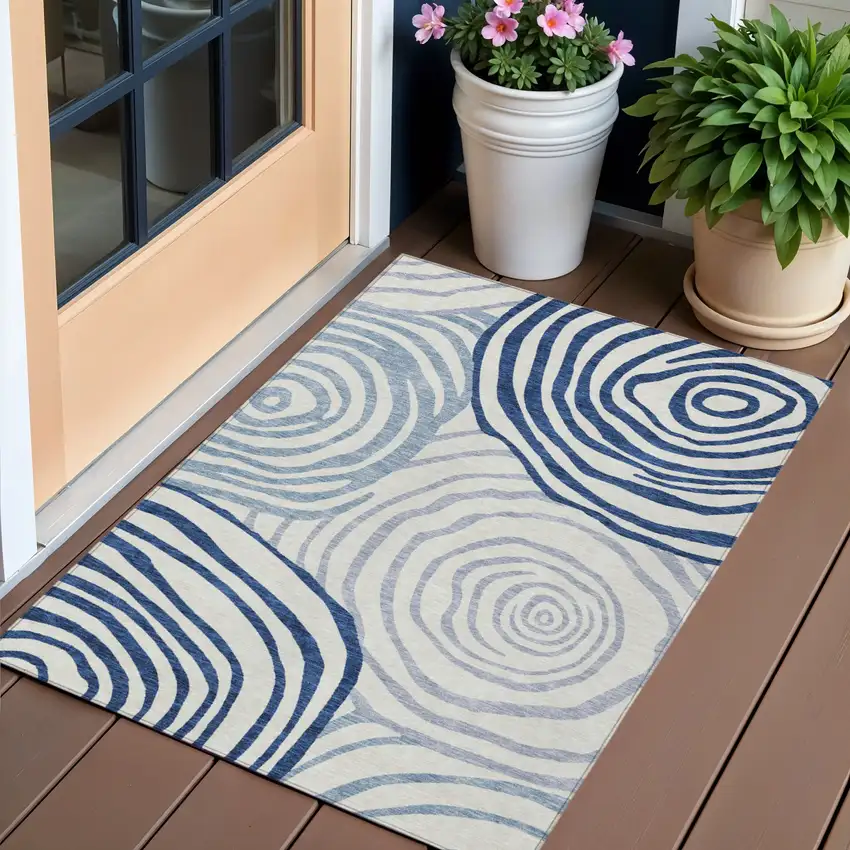 Ivory And Navy Blue Abstract Washable Indoor Outdoor Area Rug Photo 1