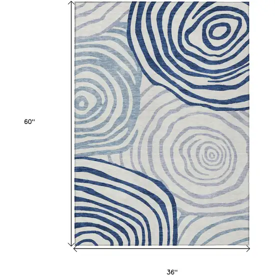 Ivory And Navy Blue Abstract Washable Indoor Outdoor Area Rug Photo 7