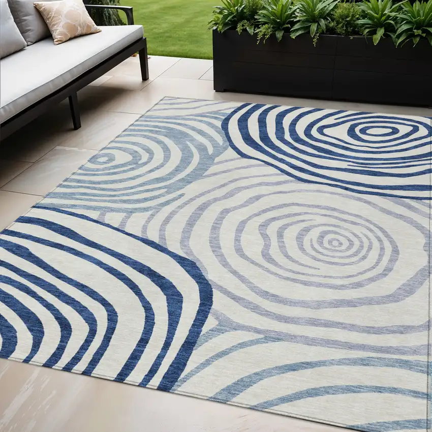 Ivory And Navy Blue Abstract Washable Indoor Outdoor Area Rug Photo 1