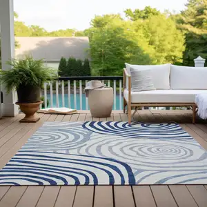Photo of Ivory And Navy Blue Abstract Washable Indoor Outdoor Area Rug