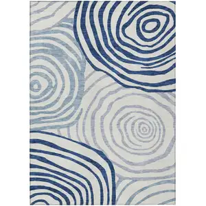 Photo of Ivory And Navy Blue Abstract Washable Indoor Outdoor Area Rug