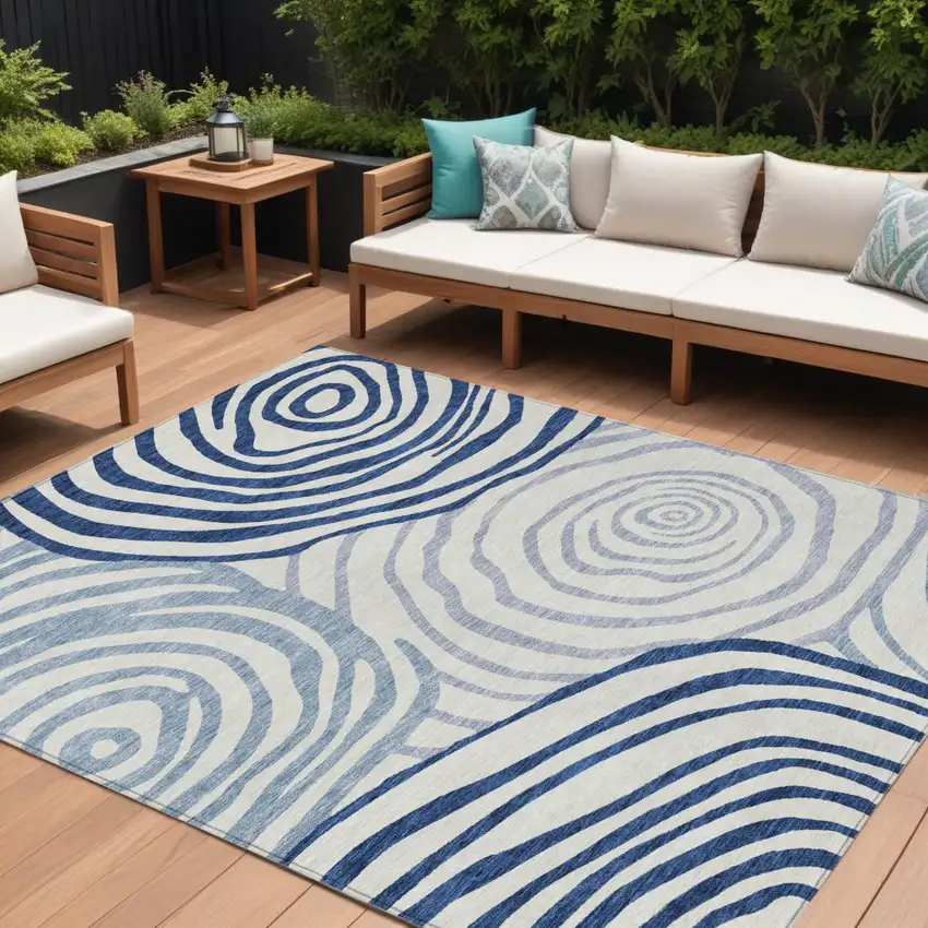 Ivory And Navy Blue Abstract Washable Indoor Outdoor Area Rug Photo 1