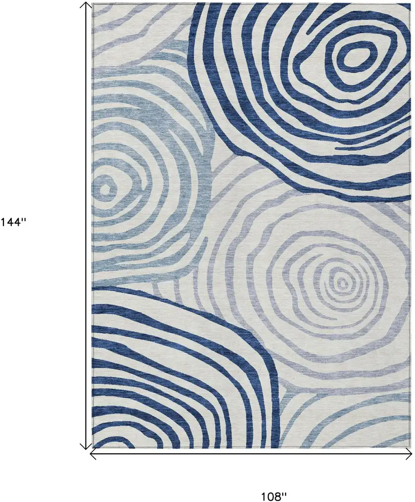 Ivory And Navy Blue Abstract Washable Indoor Outdoor Area Rug Photo 3