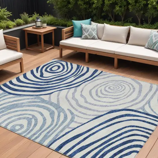 Ivory And Navy Blue Abstract Washable Indoor Outdoor Area Rug Photo 1
