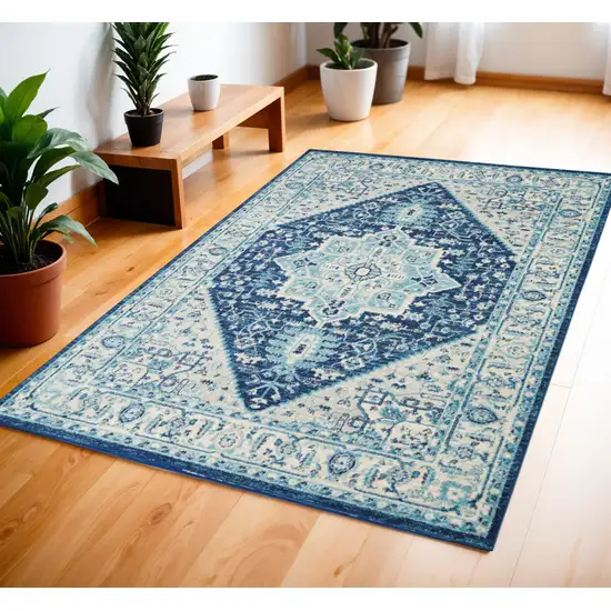 Ivory And Navy Blue Floral Medallion Distressed Area Rug Photo 1