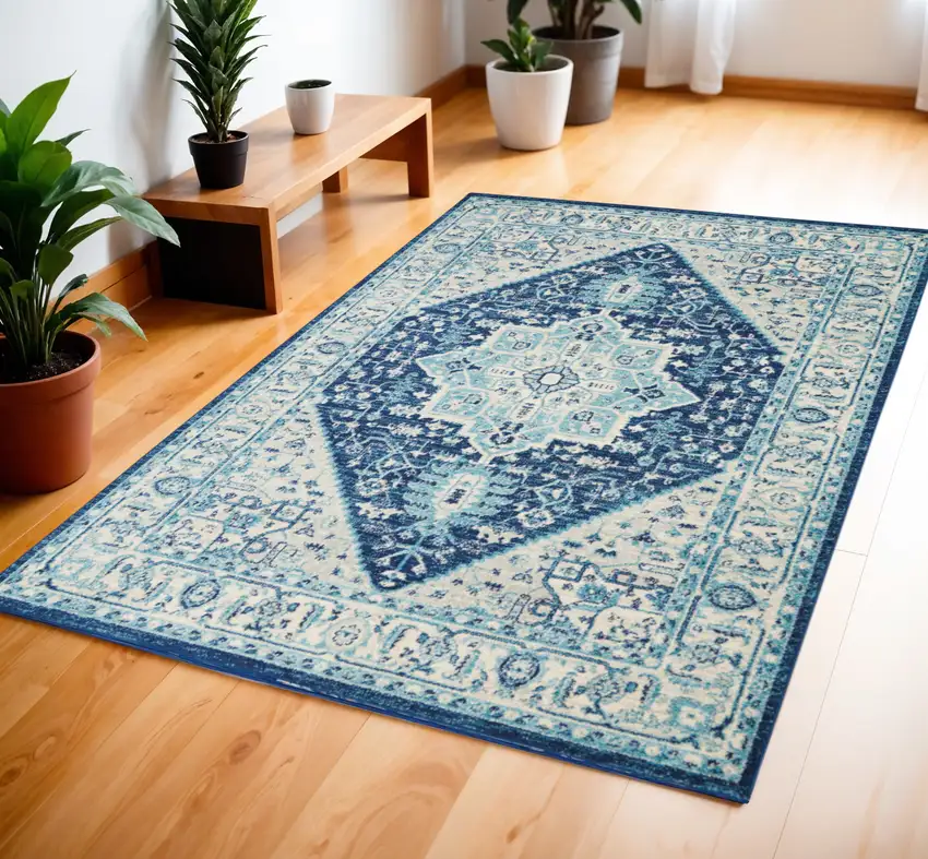 Ivory And Navy Blue Floral Medallion Distressed Area Rug Photo 1
