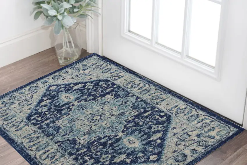 Ivory And Navy Blue Floral Medallion Distressed Area Rug Photo 1