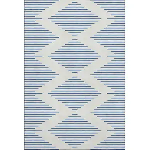 Photo of Ivory And Navy Blue Geometric Washable Area Rug With UV Protection