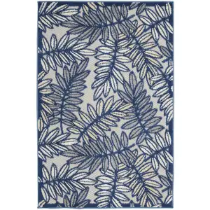Photo of Ivory And Navy Floral Non Skid Indoor Outdoor Area Rug