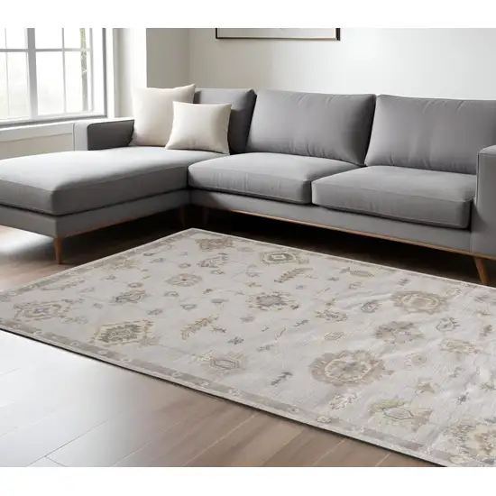 Ivory And Orange Floral Hand Knotted Stain Resistant Area Rug Photo 1
