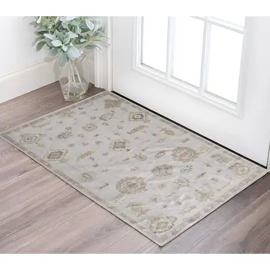 Ivory And Orange Floral Hand Knotted Stain Resistant Area Rug Photo 1