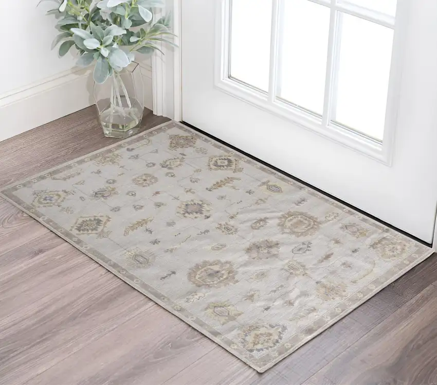 Ivory And Orange Floral Hand Knotted Stain Resistant Area Rug Photo 1