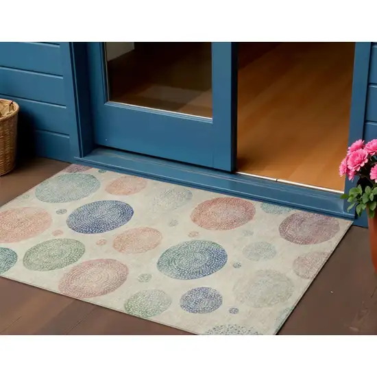 Ivory And Peach Geometric Washable Indoor Outdoor Area Rug Photo 2