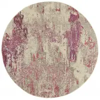 Photo of Ivory And Pink Round Abstract Power Loom Non Skid Area Rug