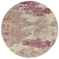 Photo of Ivory And Pink Round Abstract Power Loom Non Skid Area Rug