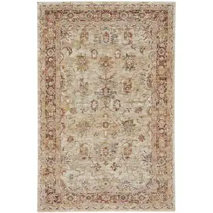 Photo of Ivory And Red Floral Distressed Area Rug
