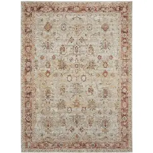 Photo of Ivory And Red Floral Distressed Area Rug