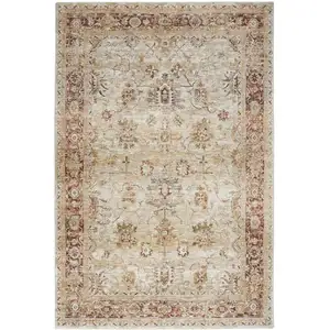 Photo of Ivory And Red Oriental Distressed Area Rug