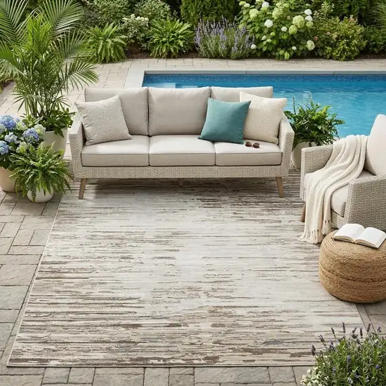 Ivory And Silver Abstract Washable Indoor Outdoor Area Rug Photo 1