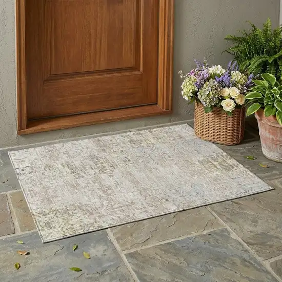 Ivory And Silver Abstract Washable Indoor Outdoor Area Rug Photo 1