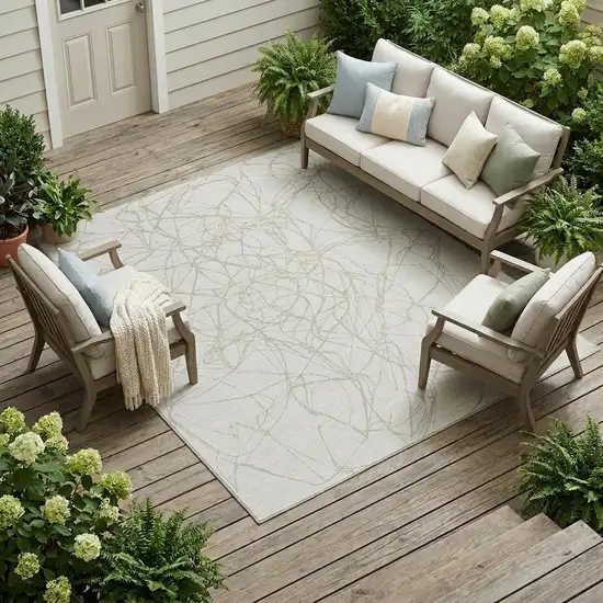 Ivory And Silver Abstract Washable Indoor Outdoor Area Rug Photo 1