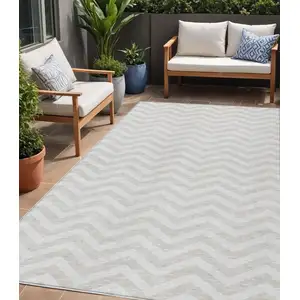 Photo of Ivory And Silver Chevron Washable Indoor Outdoor Area Rug