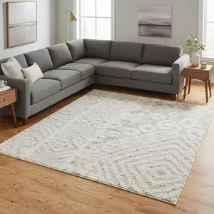 Photo of Ivory And Silver Floral Distressed Non Skid Area Rug