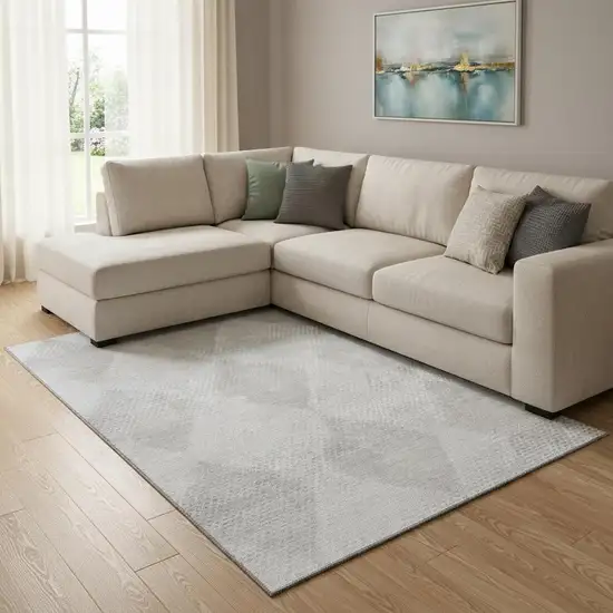 Ivory And Silver Geometric Washable Area Rug With UV Protection Photo 1
