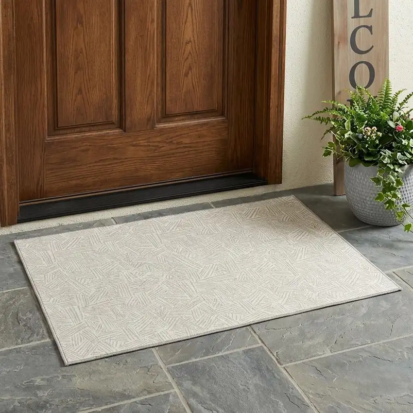 Ivory And Silver Geometric Washable Indoor Outdoor Area Rug Photo 1
