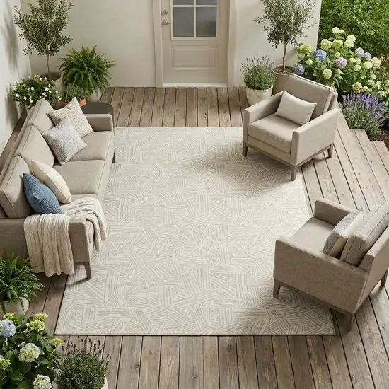 Ivory And Silver Geometric Washable Indoor Outdoor Area Rug Photo 1