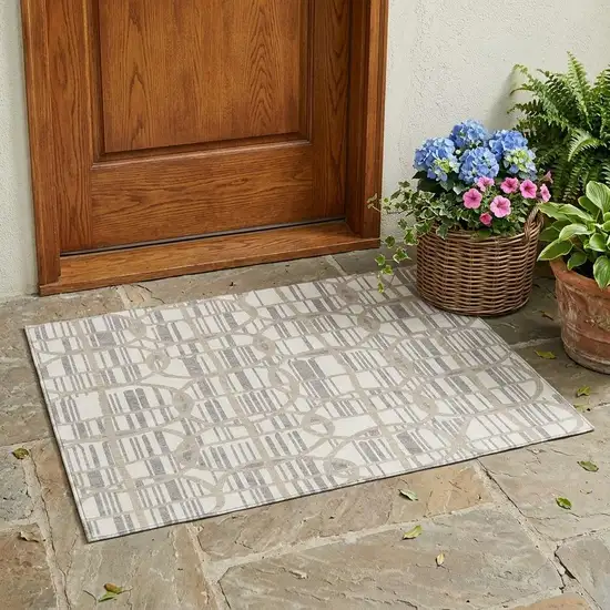 Ivory And Silver Geometric Washable Indoor Outdoor Area Rug Photo 1