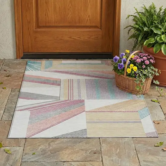 Ivory And Silver Geometric Washable Indoor Outdoor Area Rug Photo 1