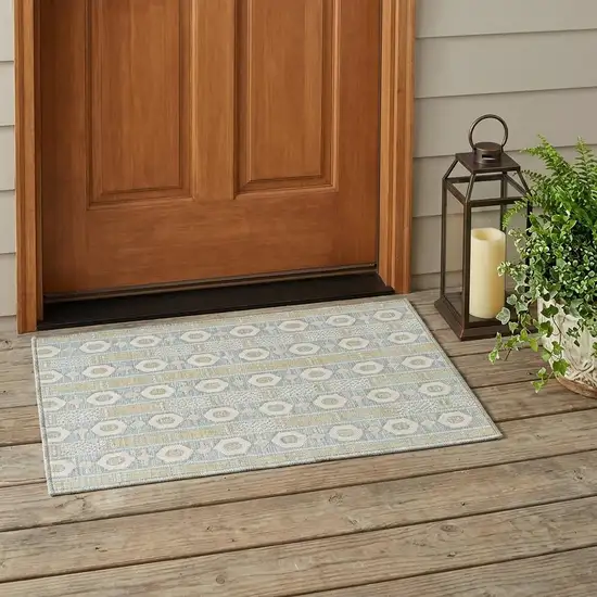 Ivory And Silver Striped Washable Indoor Outdoor Area Rug Photo 1